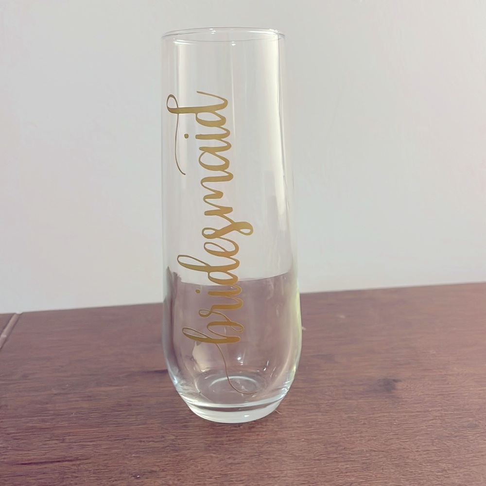 Stemless champagne glass with matte gold bridesmaid decal